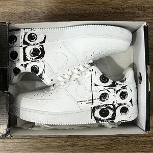White Nike Air Force 1 shoes